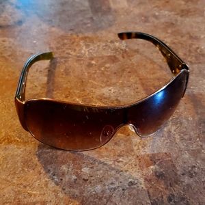 Prada light brown sunglasses.